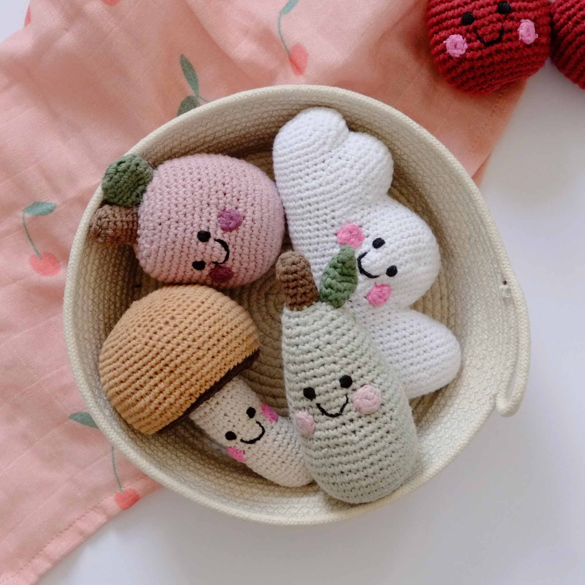 A collection of crochet rattles